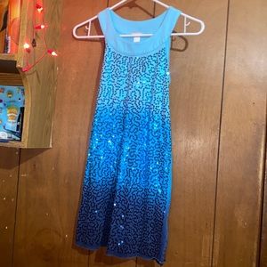Blue sparkle little girls dress from justice it does tie in the back size 10/12.